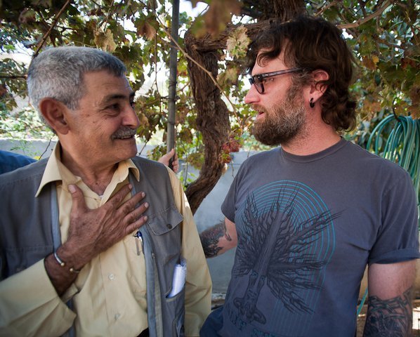 Deppen with a member of the al-Kurd family in Sheikh Jarrah